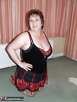 mature woman masturbating with big toys